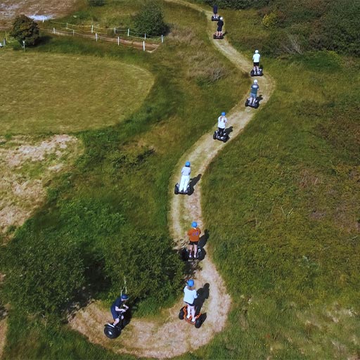 Group navigating Segway track course at Atlantic Reach with Cornwall Segway